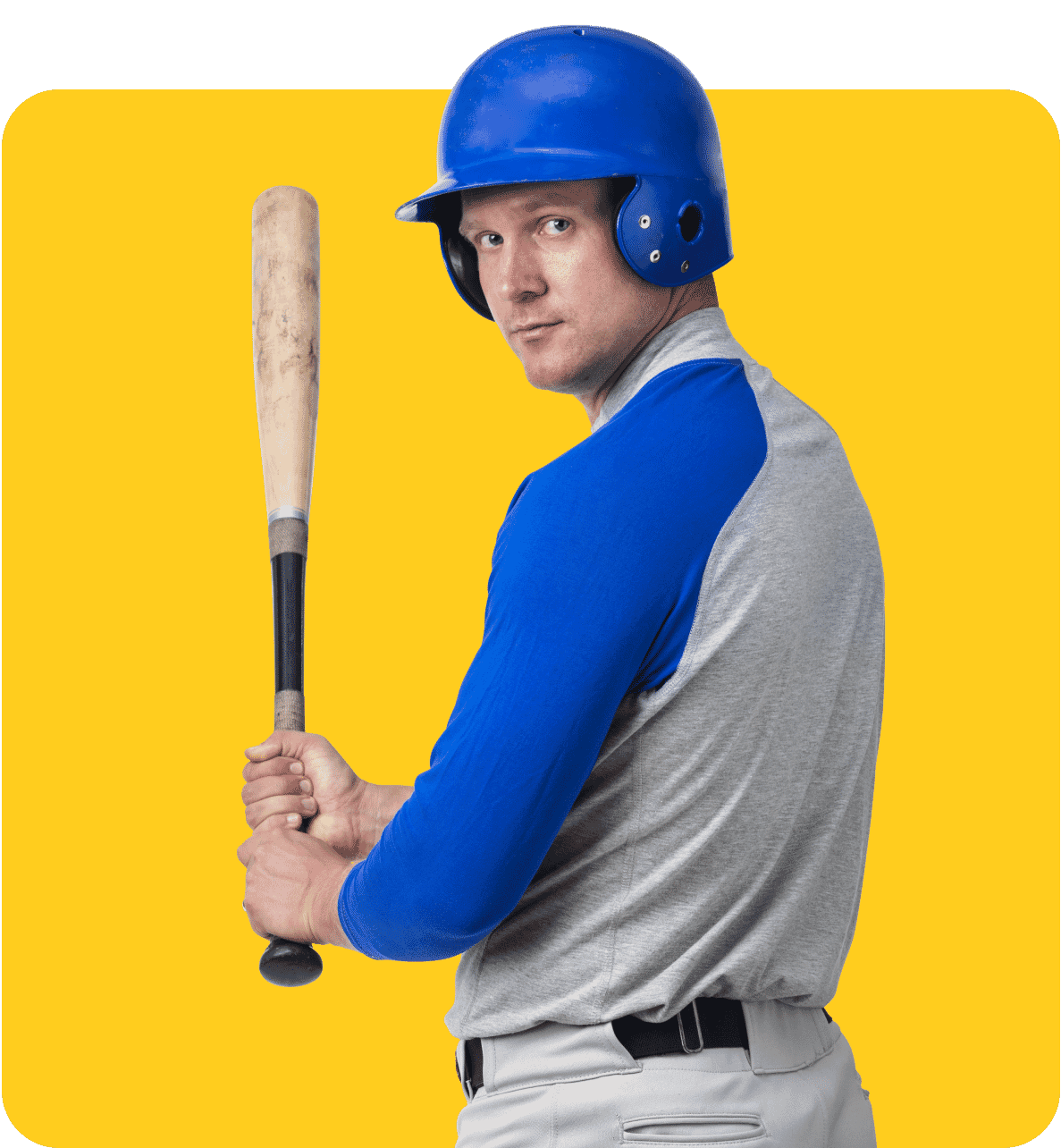 Baseball player ready to bat, featuring a bright yellow background and precise edits for a professional sports portrait.