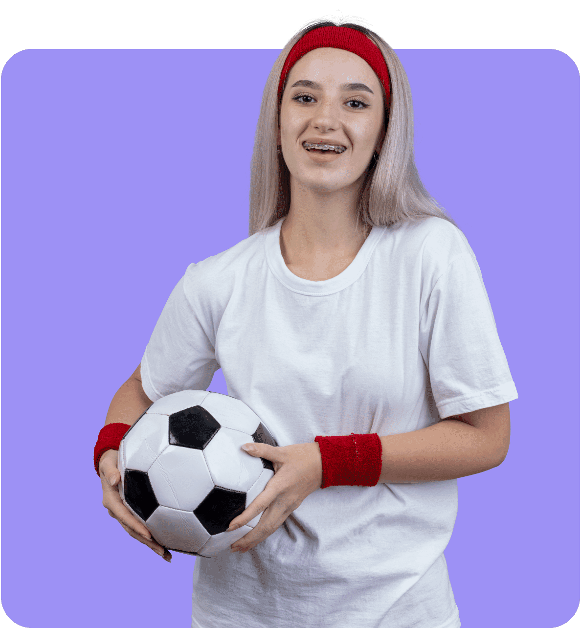 Soccer player holding a ball, enhanced with vibrant purple background and clear details for professional sports photo editing.